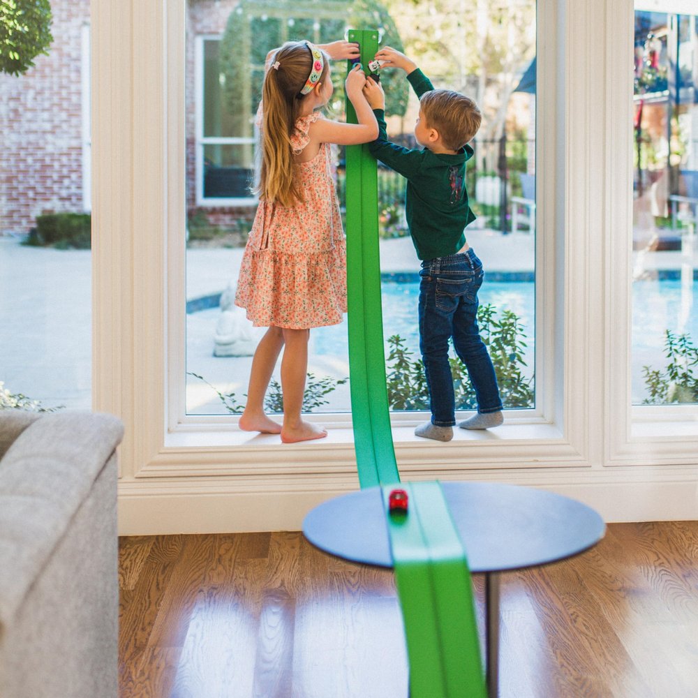 FlexTrack 5000 Flexible Race Car Track for Kids Toy with Suction Cups Compatible with Hot Wheels & Diecast 1/64th Cars and More 15 FT Long Rolls Up Portable Racetrack - 2026 Version (Nitro Green)