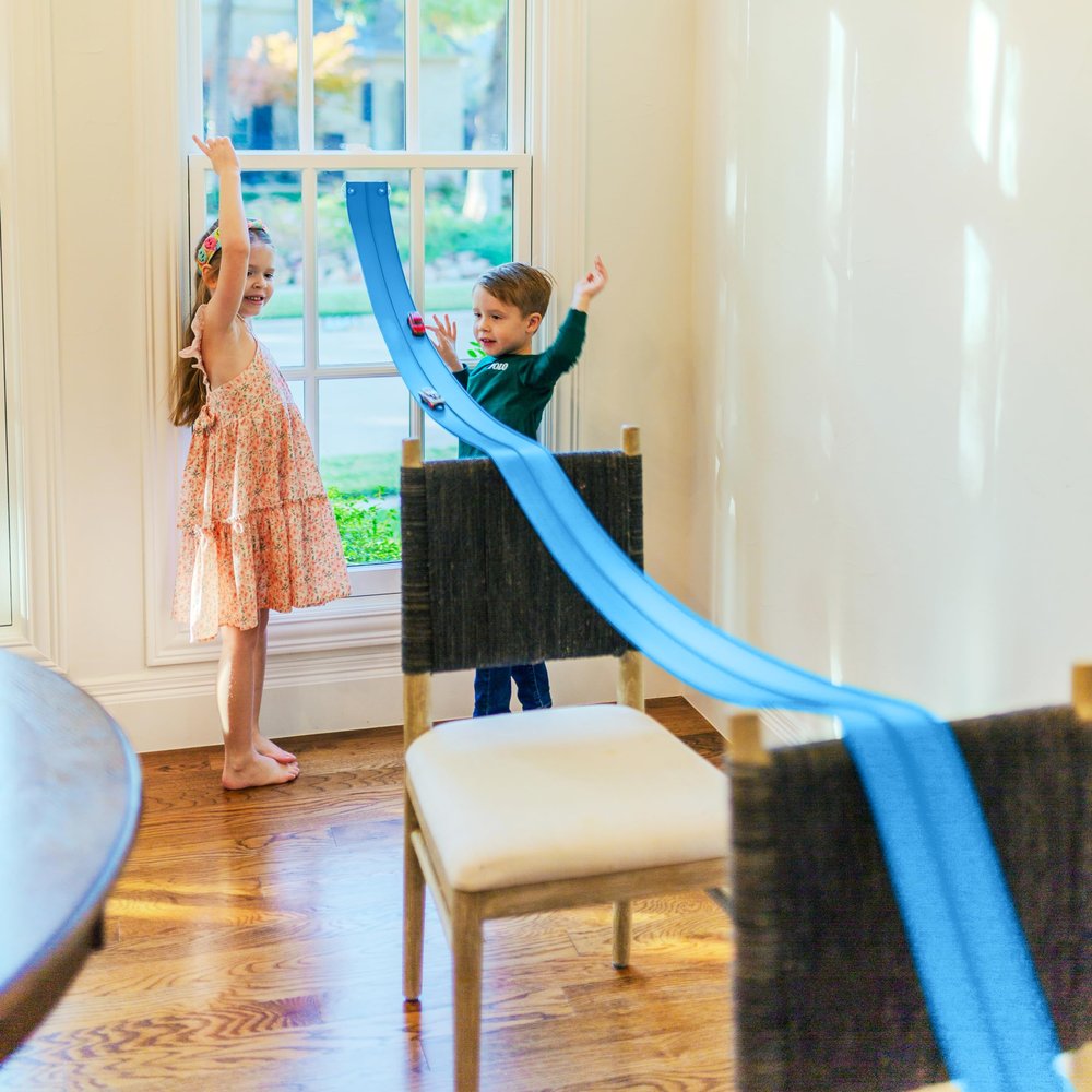 FlexTrack 5000 Flexible Race Car Track for Kids Toy with Suction Cups Compatible with Hot Wheels and Diecast 1/64th Cars and More 15 Feet Long Rolls Up Portable Racetrack New and Improved 2026 Version