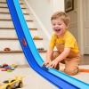 Flex Tracks 15 Ft Starter Set, Flexible Race Track for Kids 3+ with Suction Cups, Flexible Race Car Ramp Track Compatible with 1/64 Diecast Cars, Portable Rolls Up Race Tracks (Double Blue) view 1