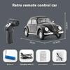 1:16 Retro RC Car D62MINI, Classic Beetle-Style Remote Control Vehicle with LED Lights, Smooth Driving & 30 Min Playtime for Adult Hobbyists Black view 2