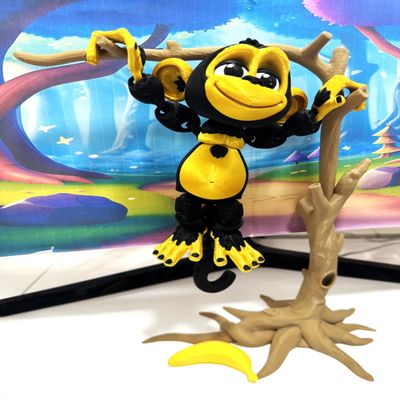 3D Printed Articulated Monkey with Banana in a Tree, 1pc 5" Tall Posable and Hangable Monkey, Articulated Animal Toy, Desk Decor (Black & Gold)