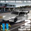 Aka Supaku RC Drift Car,1:24 Scale Remote Control Car, 2.4GHz 20KM/H 4WD High Speed RC Cars for Kids with LED Light, Two Batteries,Drifting Tires,Racing Vehicle Toy for Adults Boys Girls Silver view 4