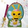 Bee Piata with Flower Crown, 24x15x5 Inches, Cardboard Construction with Matching Wood Stick, Birthday Party Decoration for Children view 1