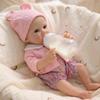 Vivetha 12 Inch Solid Silicone Baby Doll, Squishy Realistic Reborn Baby Dolls Newborn Girl, Lifelike Washable Preemie Toy with Blue Eyes and Bear Hat for Pacifier Feeding Play view 1