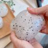 Stress Ball,Squeeze Ball: Rice Ball-StyleTranslucent White with Black Sesame Seeds, Highly Stretchy, and Bouncy for Stress Relief. Ideal for the Office Desk. view 3