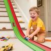 Flex Tracks 15 Ft Starter Set, Flexible Race Track for Kids 3+ with Strong Suction Cups, Flexible Car Track Race Car Ramp Track Compatible with 1/64 Diecast Cars, Portable Rolls Up Race Tracks view 1