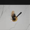 Fake Tea Bag and Spoon in a Puddle of Tea view 1