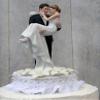 Stephanotis Groom Holding the Bride Wedding Cake Topper view 3